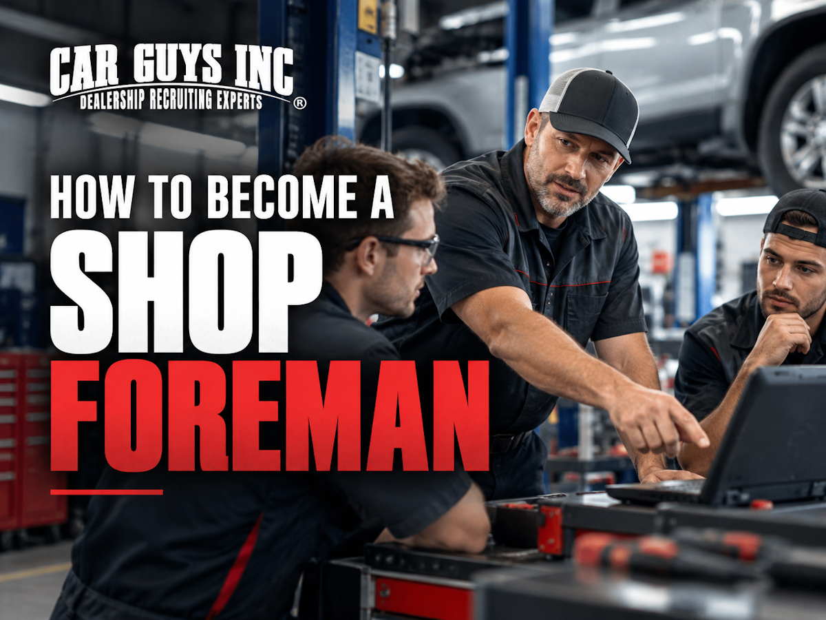 A shop foreman teaching diagnostics to auto technicians.